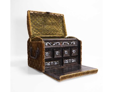 An embossed velvet casket, 18th century, French, mounted with iron hinges and latch, the drop-front revealing six Limoges mou
