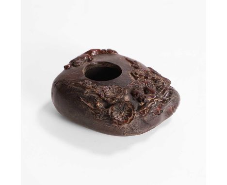 A carved horn brush washer, 20th century, Chinese, carved in relief with lotus and animal motifs, 9cm wide7.5cm deep3.5cm hig
