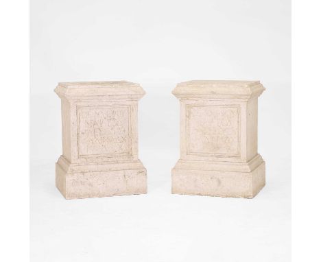 A pair of composition pedestals, of recent manufacture after the antique, each of stepped rectangular form, bearing a Greek f