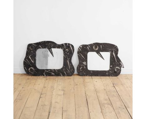A pair of fossil marble mirrors, of recent manufacture, each with an asymmetrical frame and a shaped plate, with ammonite and