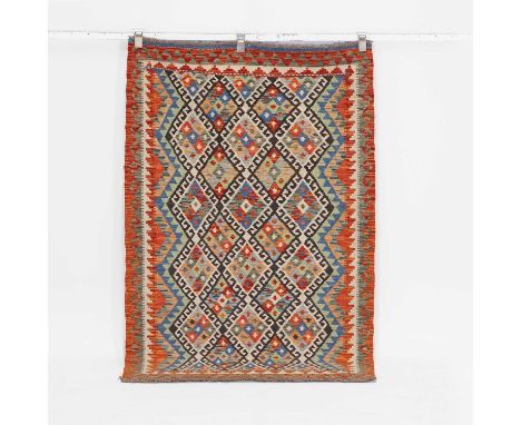 A flat-weave kilim runner, of recent manufacture, woven with repeating lozenge-form and geometric motifs in polychrome colour