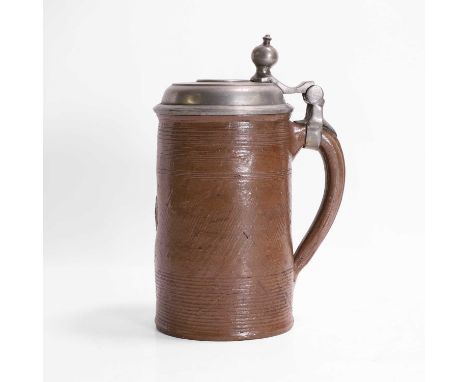 A stoneware stein, 19th century, German, the body with horizontal bands, centred with a crowned monogram and 'A B IV' in reli