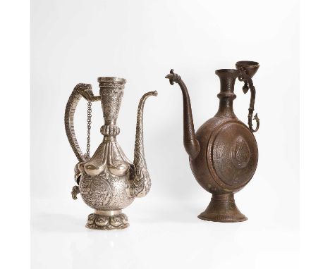 A large bronze or brass coffee pot, 19th century, Persian, with a flattened circular body, engraved all over with repeating d