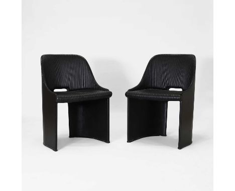 A pair of art deco-style leather tub chairs, of recent manufacture, each with rib-stitched upholstery, taken from the yacht '