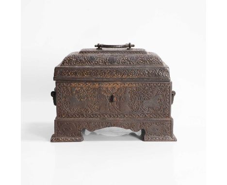 An ironwork casket, 18th/19th century, Qajar, the stepped domed top, decorated with figures and a handle, over circular panel