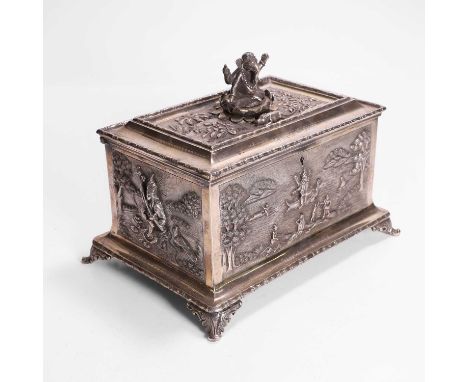 A white-metal jewellery casket, c.1890, Indian, the mounted panels with embossed, engraved and chased decoration, the cover s