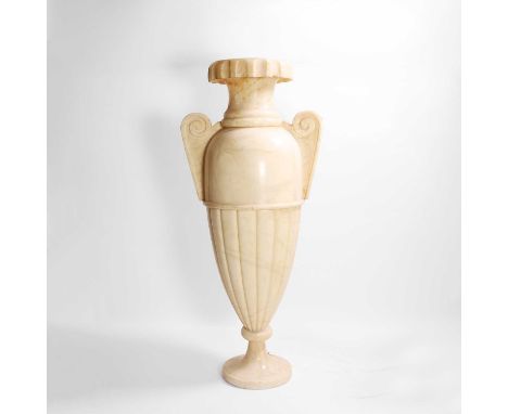 A large Art Deco carved alabaster lamp, mid-20th century, in the form of an urn, with scrolled lug handles to either side of 