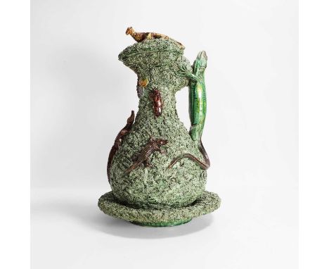 A Palissy pottery ewer, cover and stand, c.1890-1900, Portuguese, Caldas, by A Mafra, modelled with a lizard-shaped handle, t