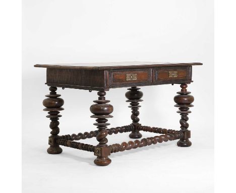 A large rosewood centre table, late 17th/early 18th century, Portuguese, Dutch colonial, having ripple-moulded drawers and du
