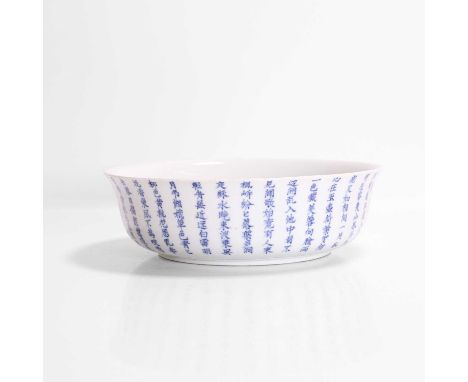 A blue and white brush washer, late Qing dynasty, Chinese, of compressed globular form with an everted rim, inscribed with po