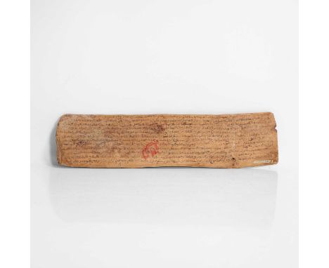 A wooden contract, probably 19th century, North African, inscribed front and back with Arabic script, and stamped with a red 