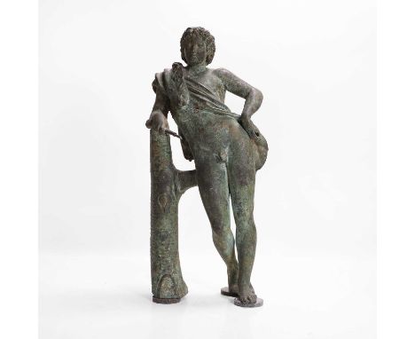 A grand tour bronze figure of 'Resting Satyr' after Praxiteles, 19th century, Italian, depicted holding a pipe and draped in 