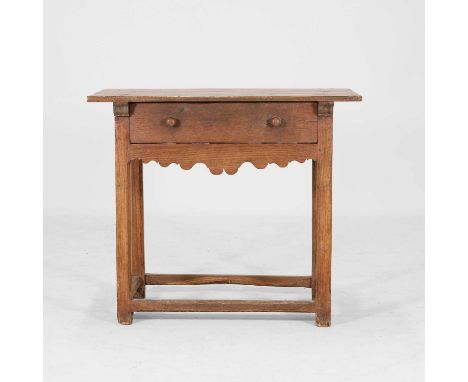 An oak side table, early 19th century, with a single drawer over a fret-cut apron, the square legs united by stretchers,86cm 