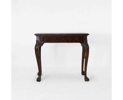 A George III mahogany side table, 19th century, the moulded top inlaid with coromandel banding, the front with a frieze drawe
