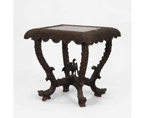 A rosewood centre table, c.1860-1870, Anglo-Indian, the top with a blind carved border decorated with animals, over a pierced
