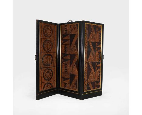 An ebonised three-fold screen, late 19th/early 20th century, later mounted with double-sided tapa cloth panels, with a gilt m