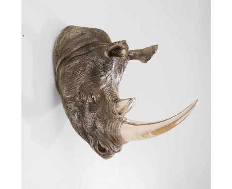 A contemporary sculpture of a rhinoceros head, of recent manufacture, in the manner of Phillip Plein, composite in chromed me
