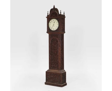 A carved rosewood longcase clock, late 19th century, Anglo-Indian, with a four-pillar single fusee movement, the ornately car