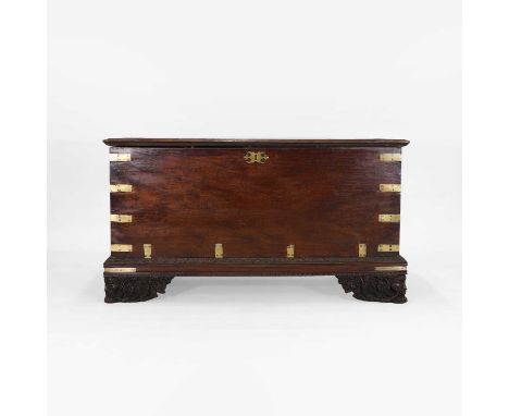 A large padouk coffer, 18th century, Dutch colonial, probably Batavian, the hinged lid opening to reveal small drawers within