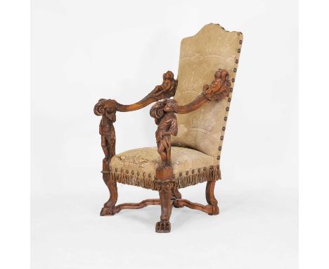 An carved walnut and beech armchair in the manner of Andrea Brustolon, late 19th/early 20th century, Italian, with a rectangu