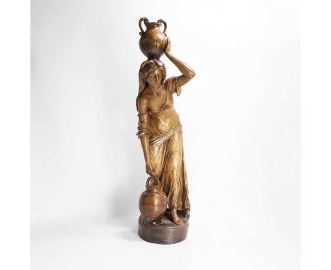 A Goldscheider pottery figure of a female water carrier c.1880, modelled leaning down to pick up a pitcher, her other hand su