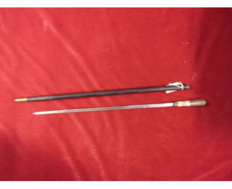 Indian Sword Stick, a lovely ebonised wood body, bone handle with a floral design and brass Lion's head on the top. An excell
