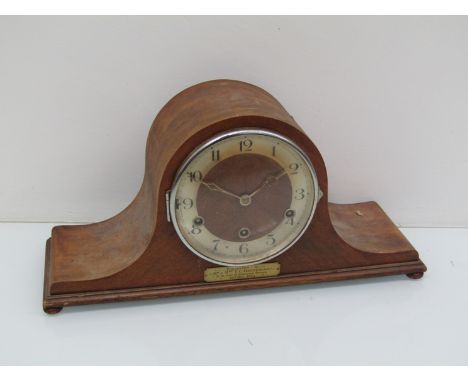 A 1930's walnut cased Napoleon hat mantel clock with striking and chiming movement, platform escapment, 21cm high