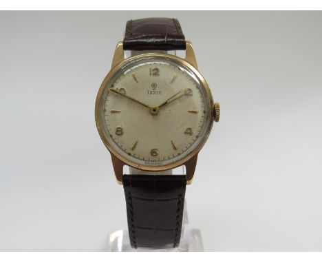 TUDOR: a mid 20th Century 9ct gold cased gent's wristwatch, silvered dial with Arabic numerals, manual wind 15 jewel Tudor si