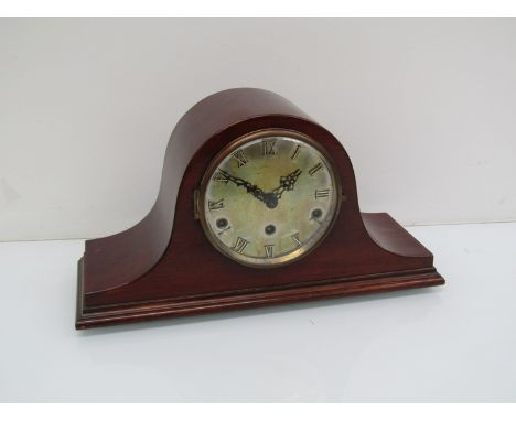 An early 20th Century mahogany Napoleon hat striking and chiming mantel clock, key and pendulum, 23cm high