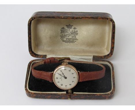 ROLEX: an early 20th Century 9ct gold cased wristwatch with silvered Arabic dial, 15 jewel signed manual wind movement, with 