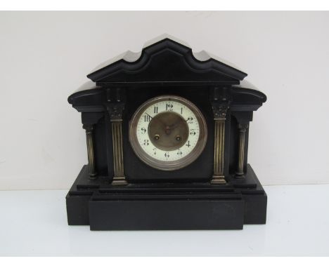 A 19th Century slate mantel clock of architectural form, French drum striking movement, 33cm high