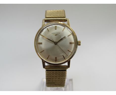 LONGINES: a 9ct gold cased gent's wristwatch, silvered dial with centre seconds, calibre 280 manual wind movement signed and 