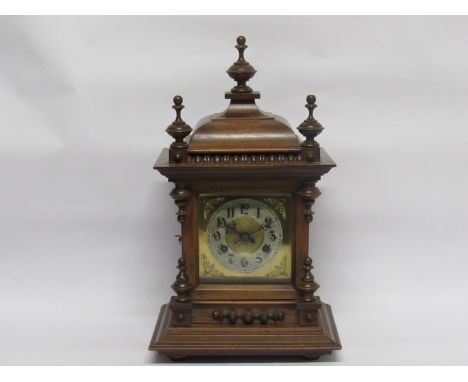 A late 19th Century German bracket clock of architectural form with striking and gong 8-day movement striking on a coiled gon