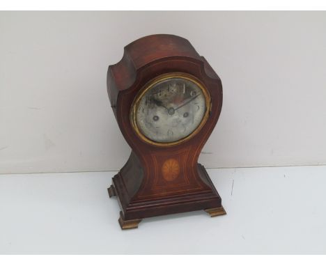 An Edwardian mahogany and inlaid mantel clock for balloon form, silvered Arabic dial, continental countwheel strike movement,