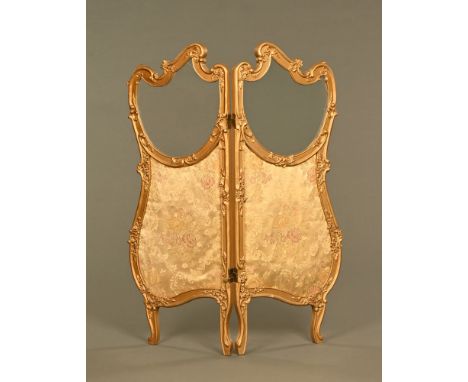 A late Victorian continental style gilt painted twofold glass and fabric screen.  Height 121 cm, each panel width 46 cm.