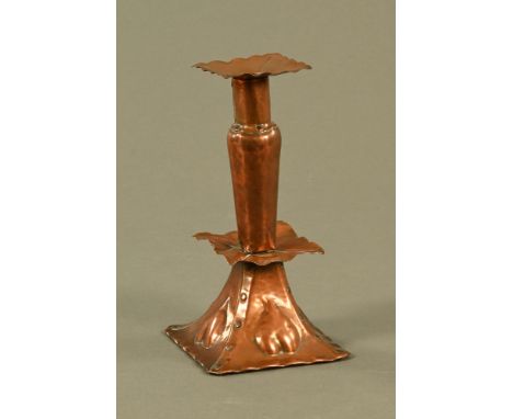 An Arts and Crafts copper candlestick, in the Keswick style with detachable sconce.  Height 21 cm.
