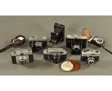 A Russian Zorki vintage camera, together with five others.