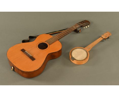 A vintage Hofner flamenco guitar, together with a Ukulele.