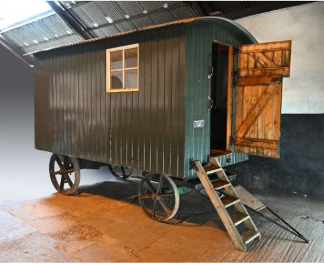 A large Eddison Plant Ltd Grantham Vintage Living Van No 4986, circa 1960-70, with corrugated tin roof, pine clad sides and p