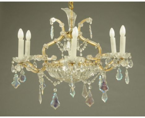A Venetian glass chandelier type light fitting, with faceted glass drops, six branch.  Diameter +/- 80 cm.