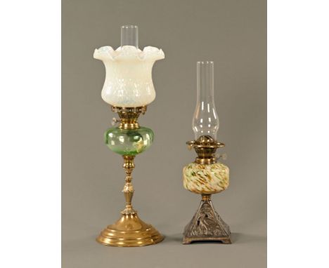 A Victorian brass oil lamp with vaseline glass shade, and another with cast base.  Tallest including chimney 65 cm.