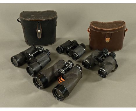 A pair of vintage Bausch &amp; Lomb 8 x 56 binoculars, together with three other pairs.