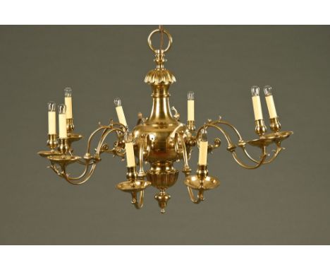A Georgian style brass chandelier, drilled for electricity.  Height 70 cm, diameter 100 cm.