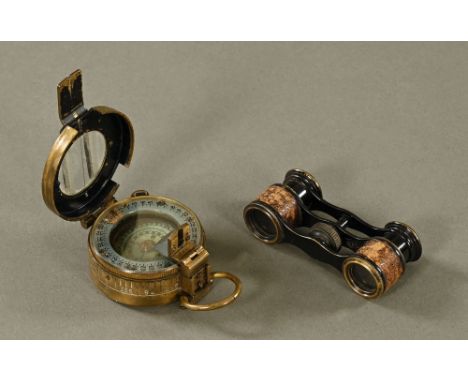 A 1945 Mk 3 military compass and small pair of opera glasses.