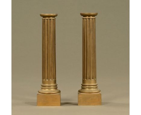 A pair of 19th century brass fluted column lamp bases (not drilled).  Height 38 cm.