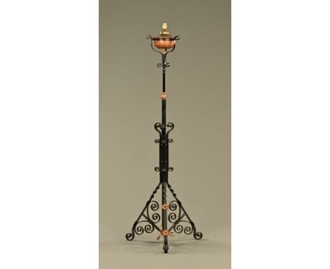 A 19th century wrought iron lamp standard with copper reservoir.  Height 140 cm.