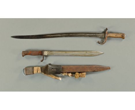 A World War One German butcher bayonet by Alex Coppel, with scabbard, together with a French model 1871 Chassepot sword bayon