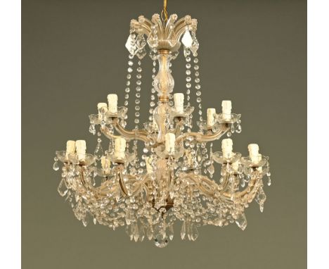 A large glass chandelier, two tier with faceted glass drops.  Height excluding suspension 72 cm, maximum width +/- 74 cm. CON