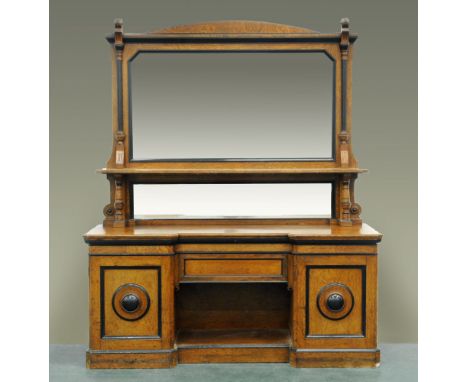 A late Victorian pollard oak mirror backed sideboard, with shelf to back and fitted with drawers and cupboards flanked by can