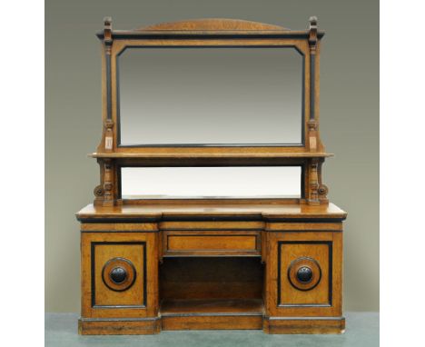 A late Victorian pollard oak mirror backed sideboard, with shelf to back and fitted with drawers and cupboards flanked by can